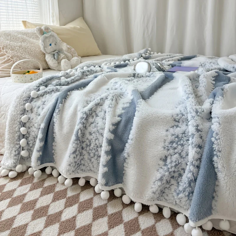 Dual tone tussle throw blanket
