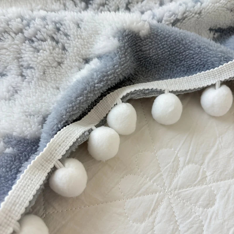 Dual tone tussle throw blanket