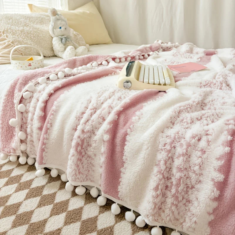 Dual tone tussle throw blanket