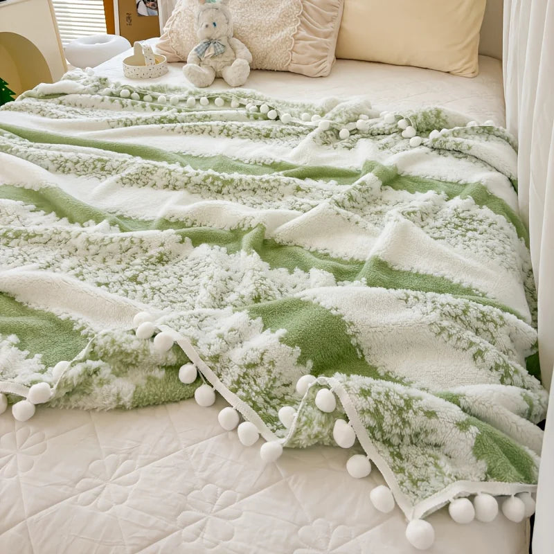 Dual tone tussle throw blanket