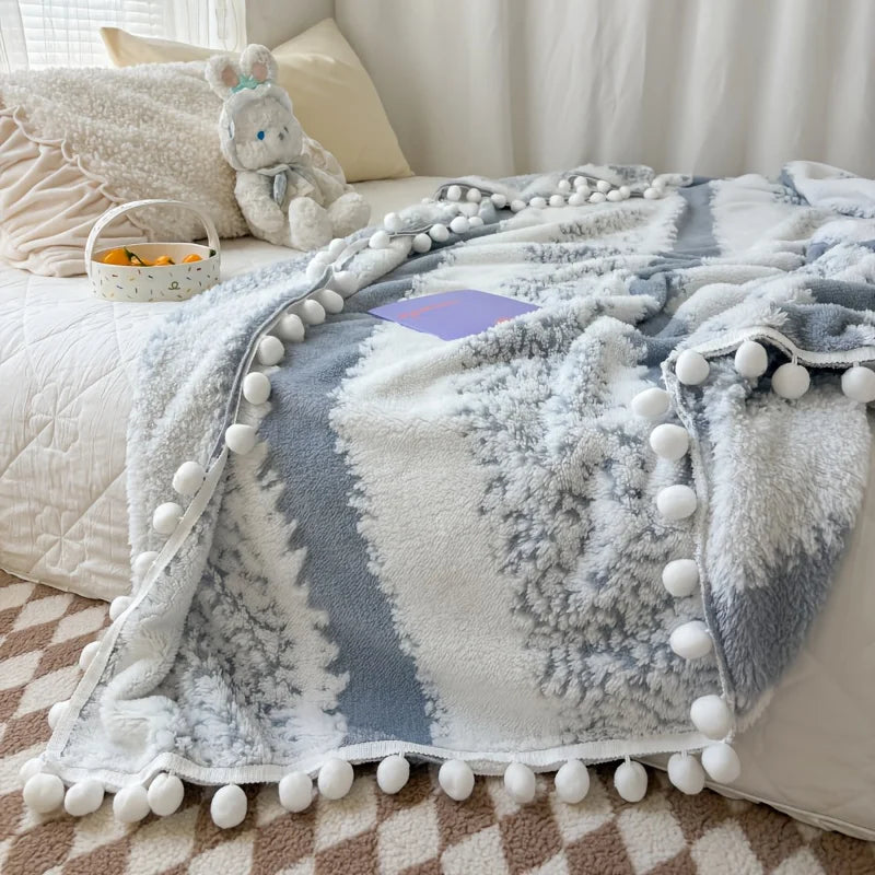 Dual tone tussle throw blanket