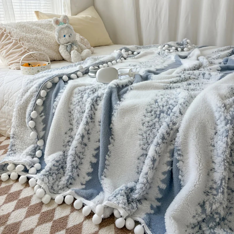 Dual tone tussle throw blanket