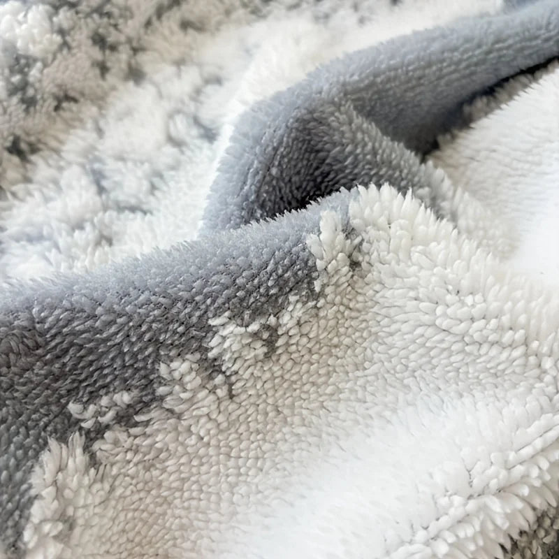 Dual tone tussle throw blanket